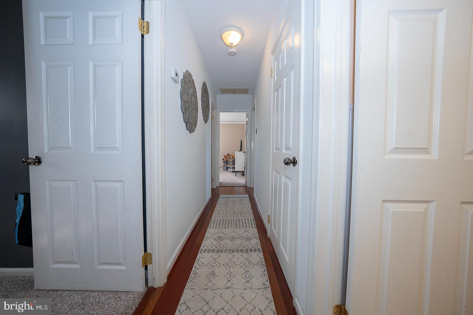 70 Hidden Valley Road Aston, PA 19014 - Photo 22 of 62 a view of a hallway with wooden floor