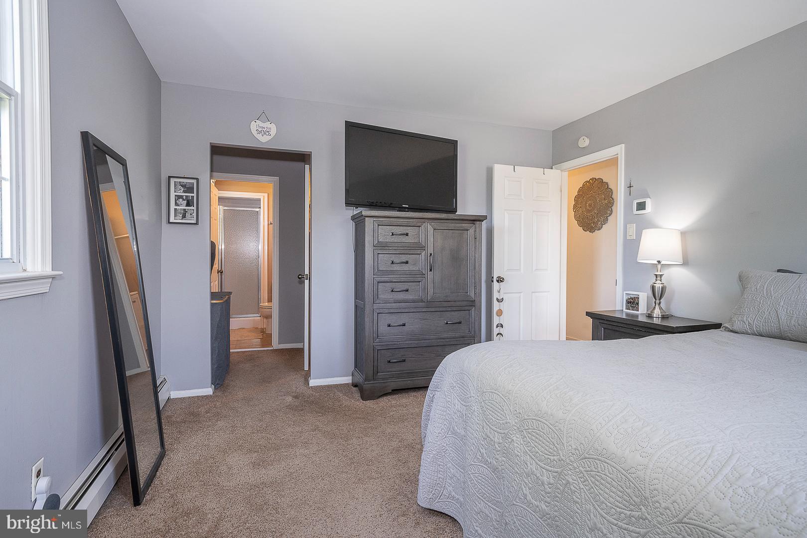 70 Hidden Valley Road Aston, PA 19014 - Photo 34 of 62 a bedroom with a bed and a flat screen tv