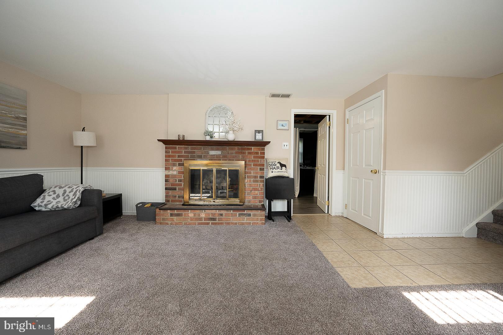 70 Hidden Valley Road Aston, PA 19014 - Photo 40 of 62 a view of a livingroom with furniture and a fireplace