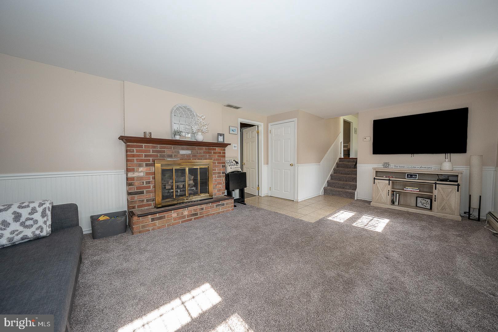 70 Hidden Valley Road Aston, PA 19014 - Photo 42 of 62 a view of livingroom with furniture and fireplace