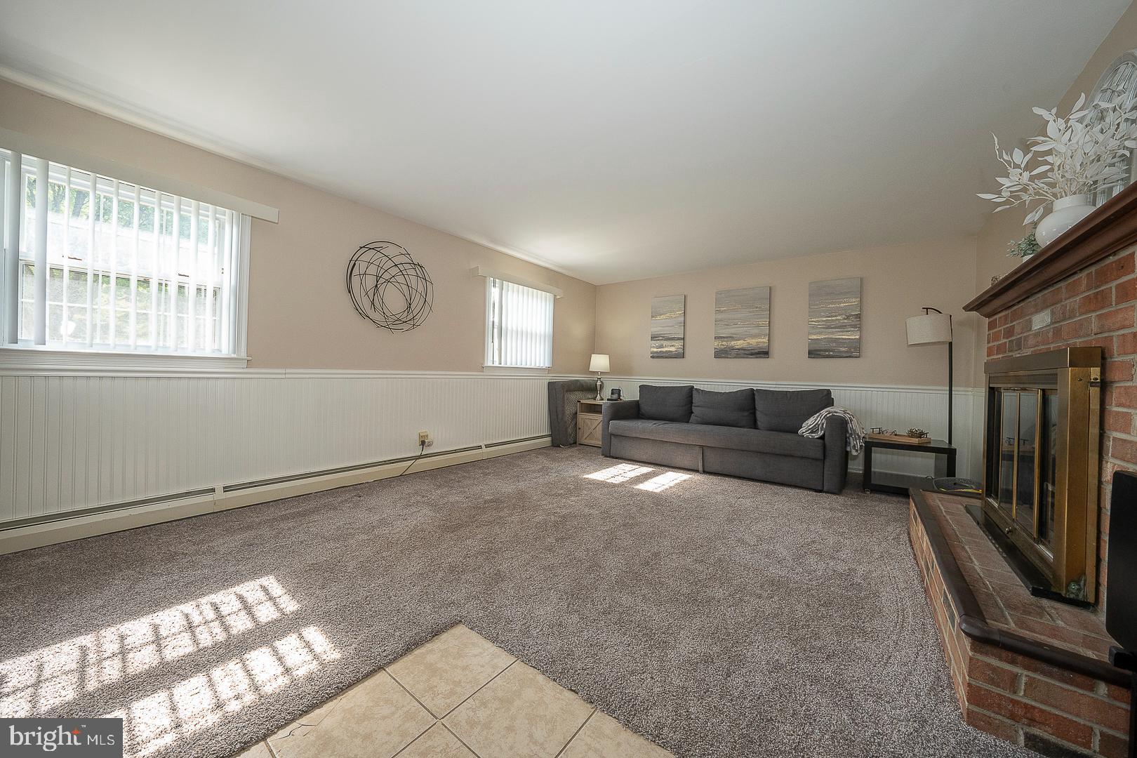 70 Hidden Valley Road Aston, PA 19014 - Photo 45 of 62 a living room with furniture and a window
