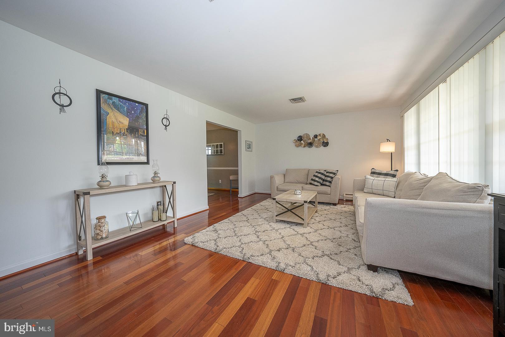 70 Hidden Valley Road Aston, PA 19014 - Photo 6 of 62 a living room with furniture and a wooden floor