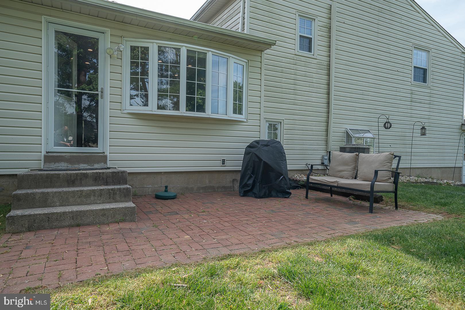 70 Hidden Valley Road Aston, PA 19014 - Photo 61 of 62 a view of a house with a backyard and sitting area