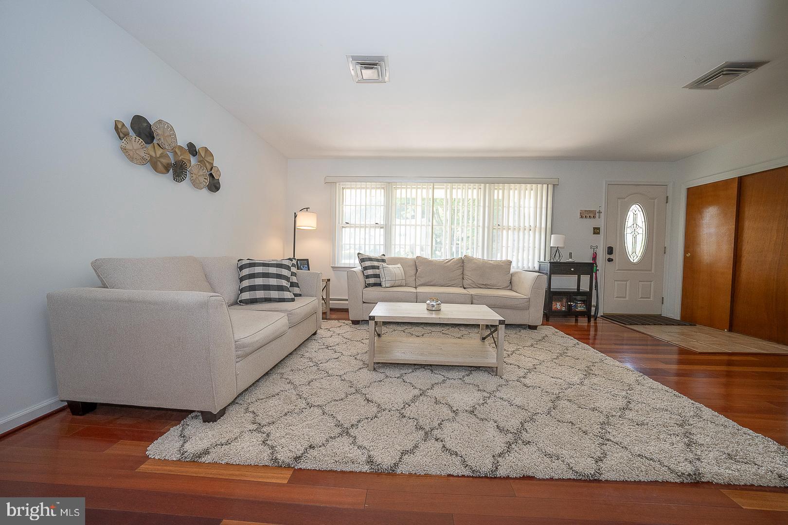 70 Hidden Valley Road Aston, PA 19014 - Photo 8 of 62 a living room with furniture and a rug