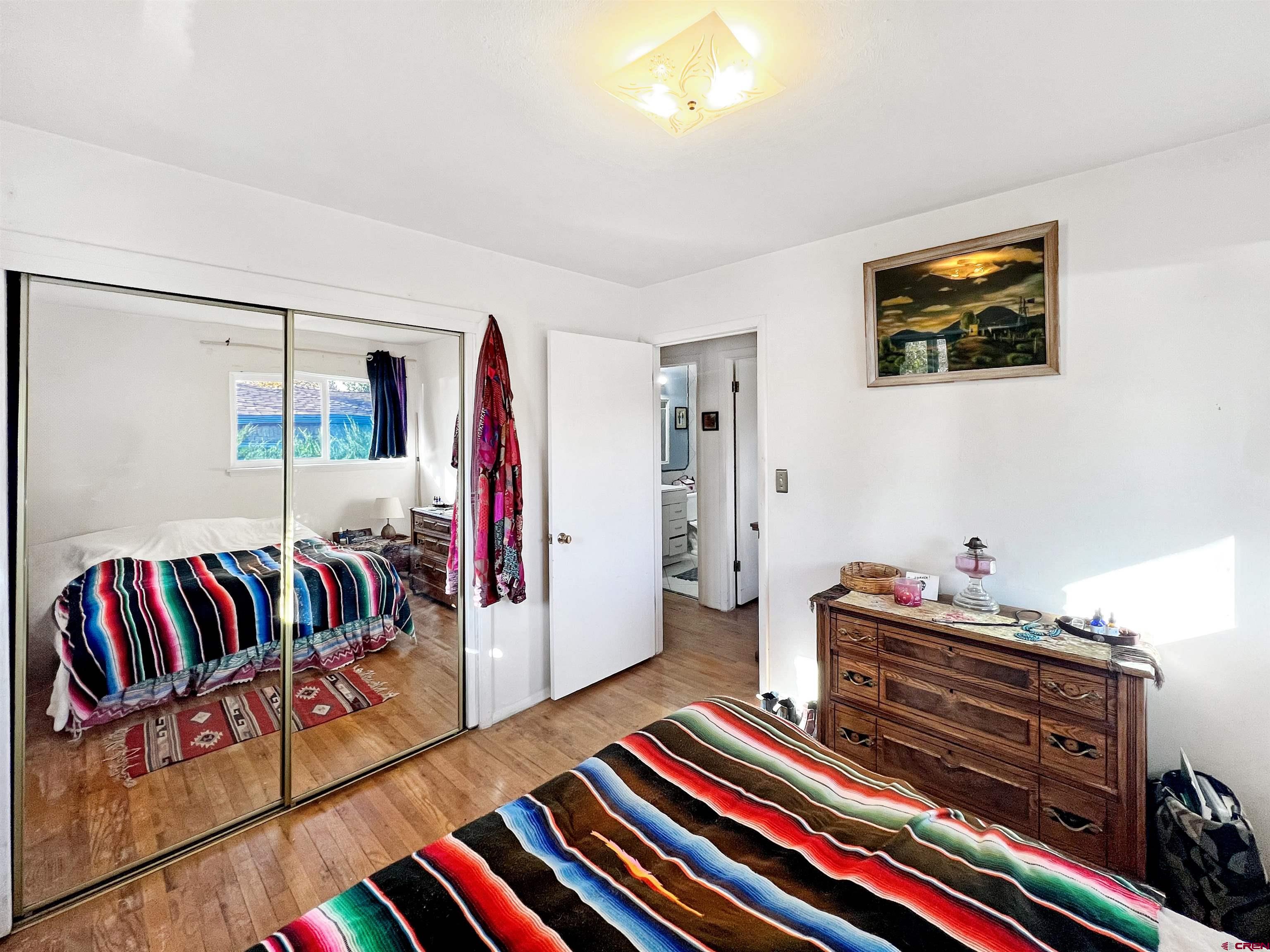 1005 South Cedar Street Cortez, CO 81321 - Photo 12 of 19 a living room with furniture and a piano