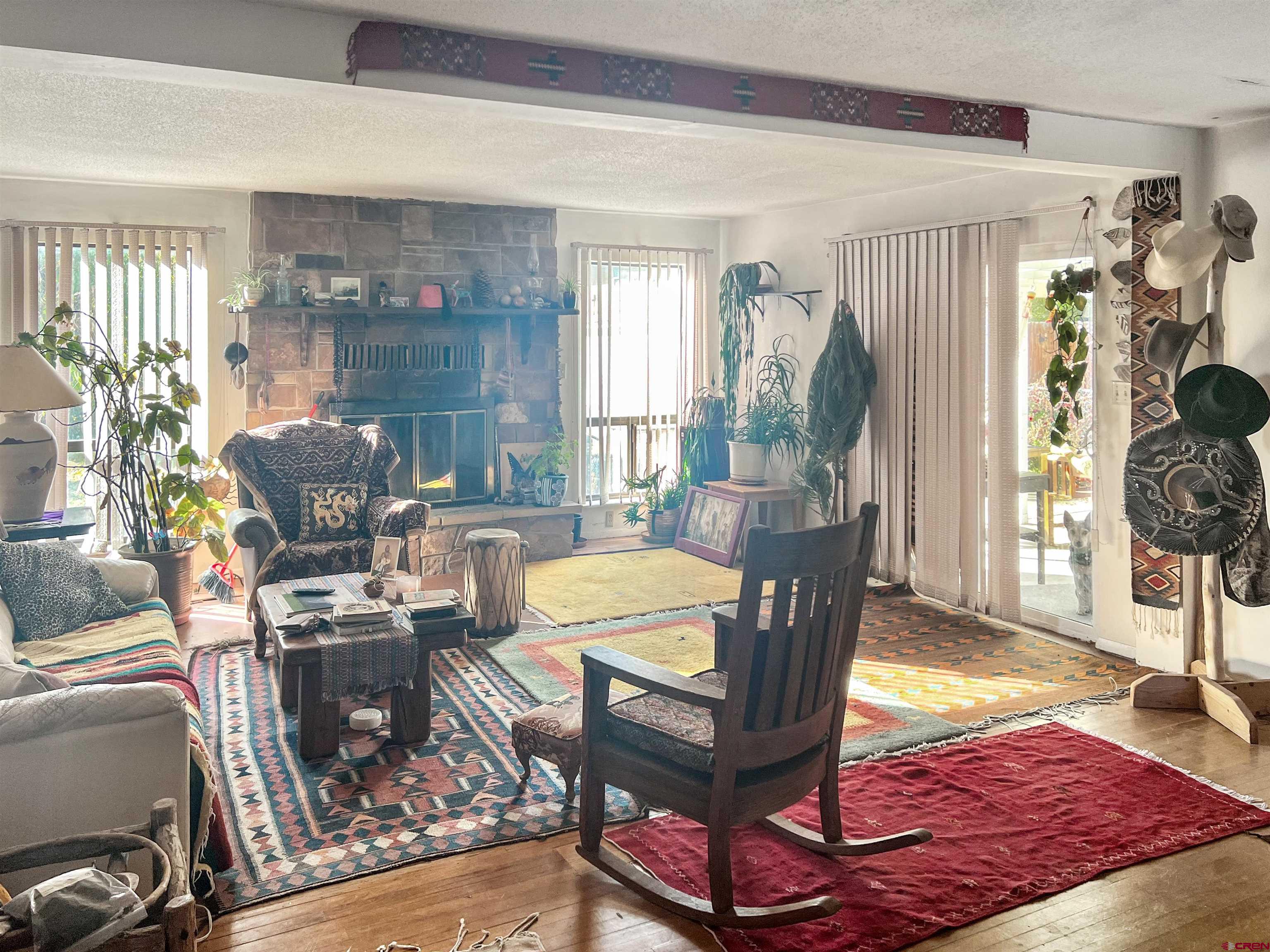 1005 South Cedar Street Cortez, CO 81321 - Photo 3 of 19 a living room with furniture and a window