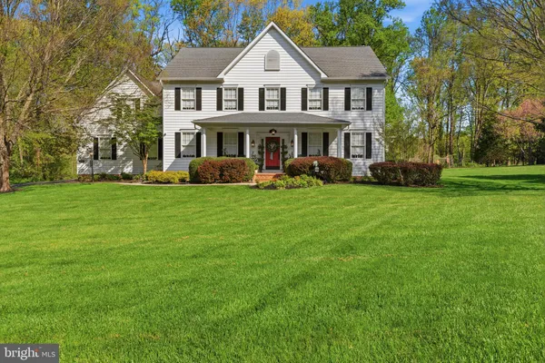 a view of a yard in front of a house