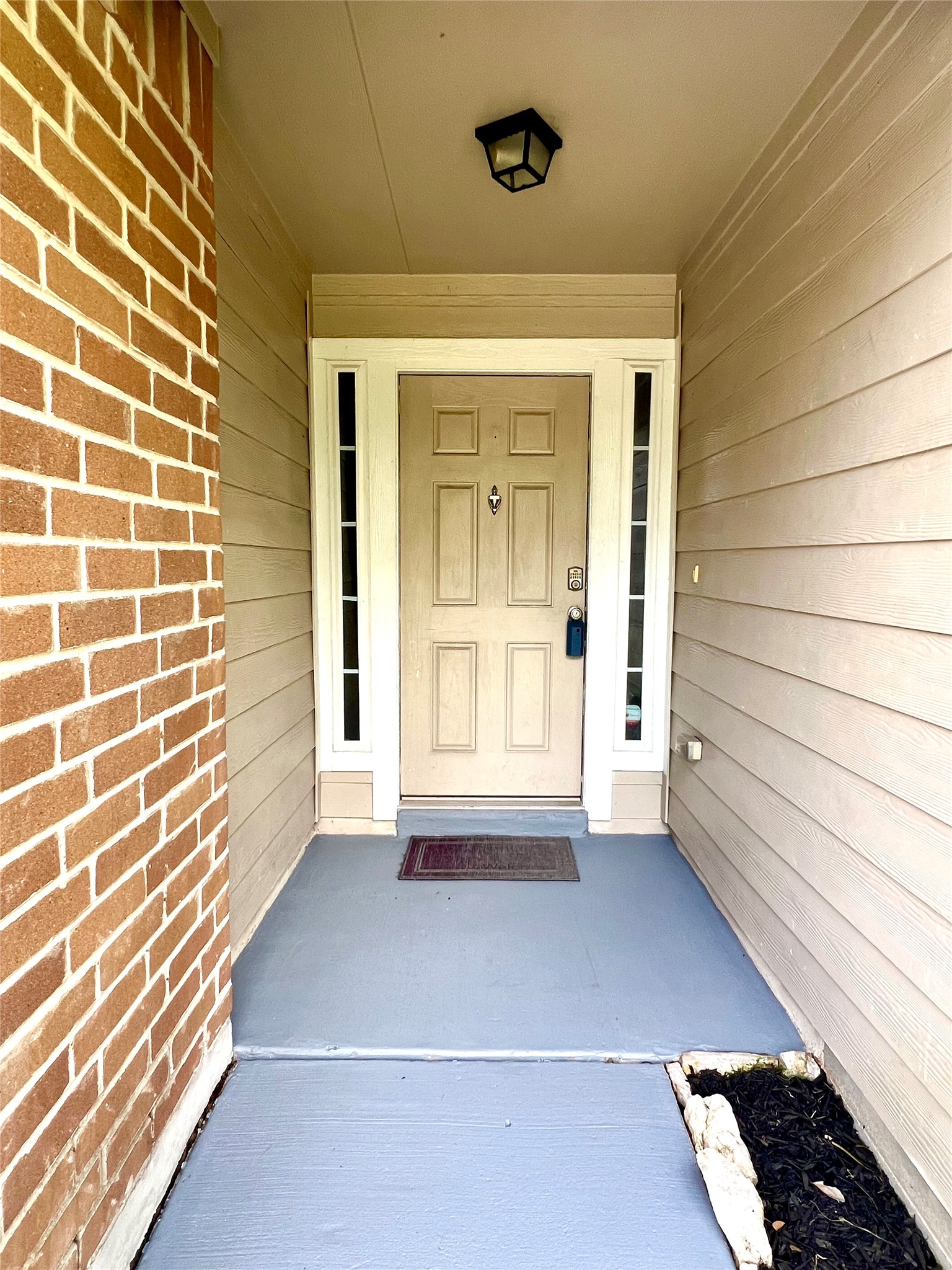 4414 Kulkarni Street Houston, TX 77045 - Photo 2 of 18 a view of an empty room and a window