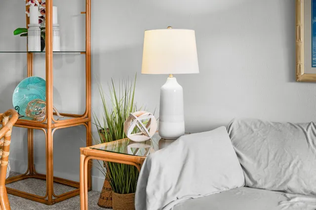 a bedroom with bed and a window