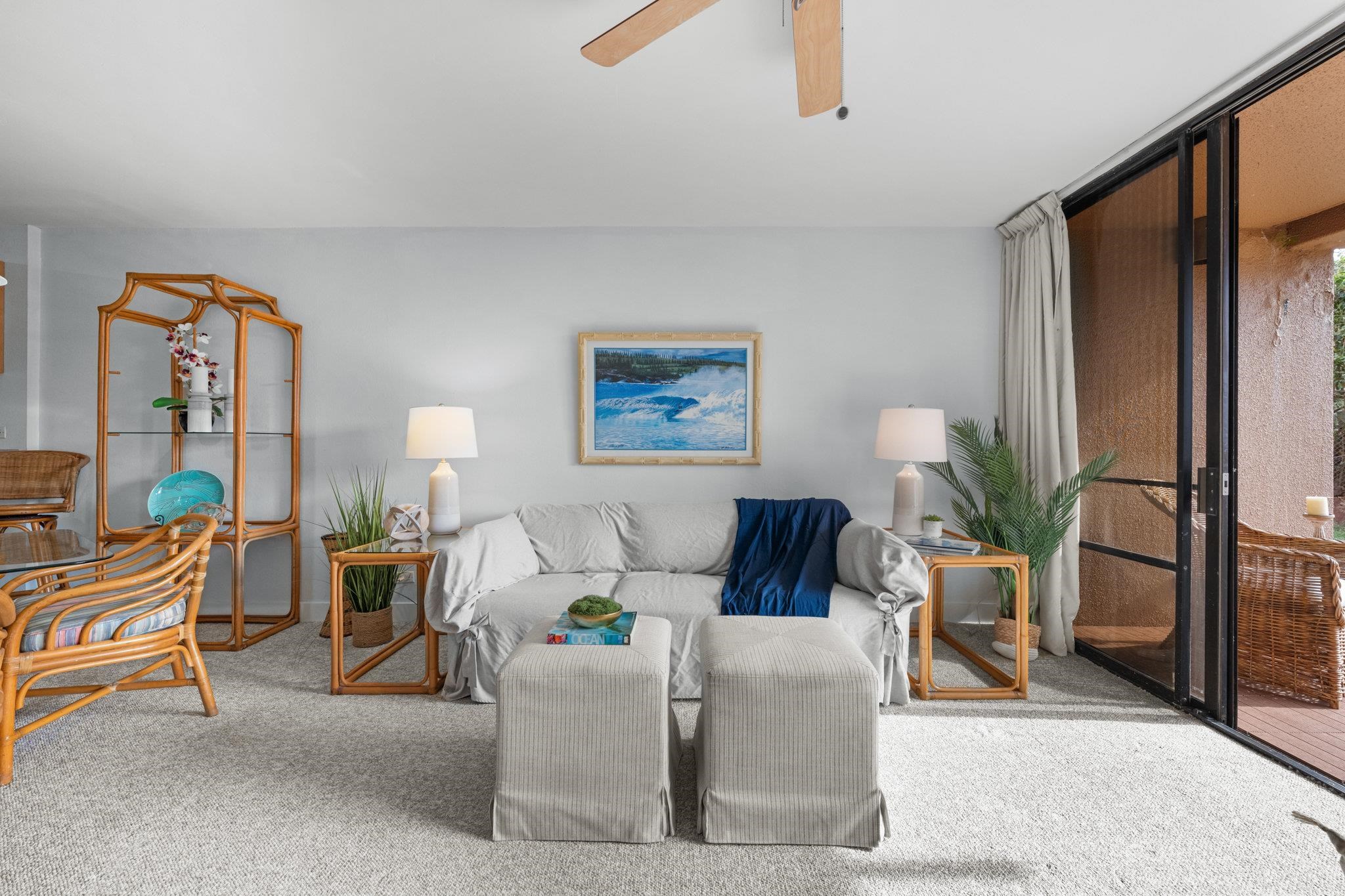 4242 Lower Honoapiilani Road, Unit E304 Lahaina, HI 96761 - Photo 5 of 34 a living room with furniture and a window