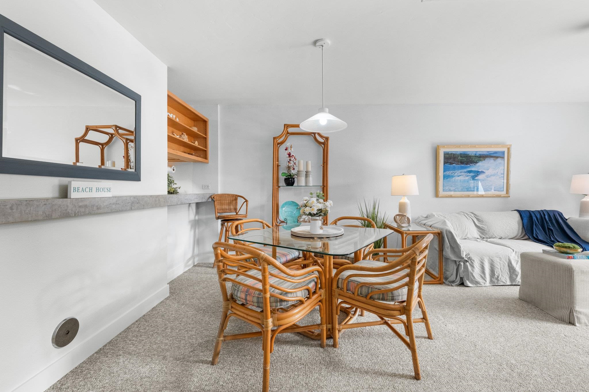 4242 Lower Honoapiilani Road, Unit E304 Lahaina, HI 96761 - Photo 10 of 34 a view of a dining room with furniture