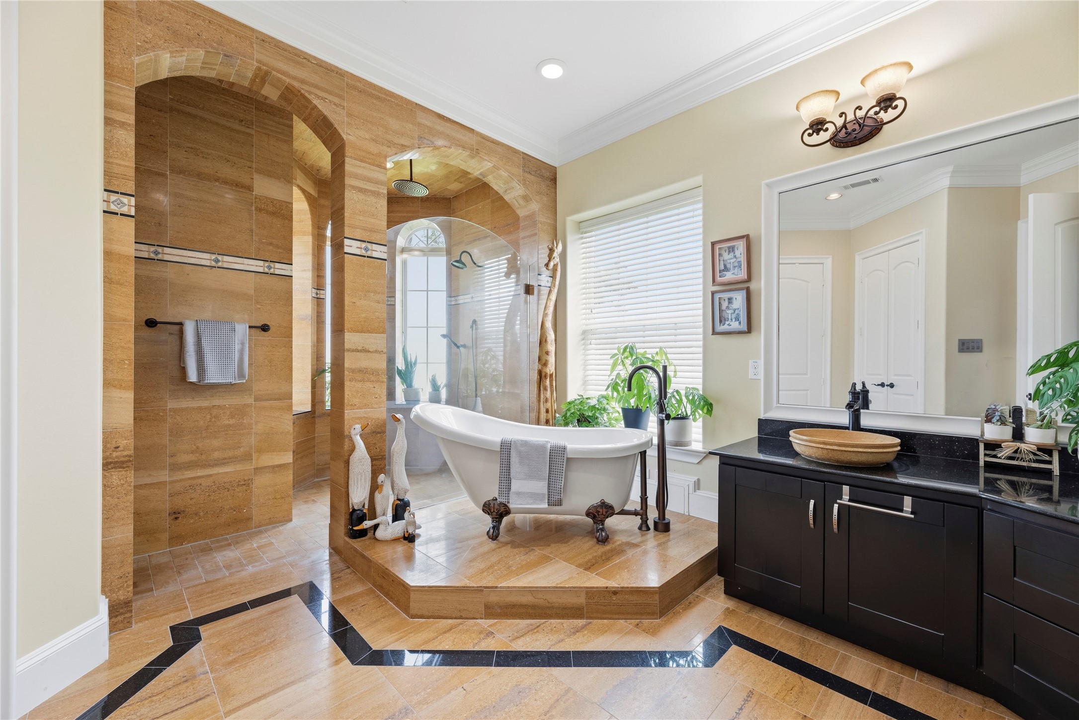6306 Farm To Market 359 Fulshear, TX 77441 - Photo 19 of 44 This spa-like sanctuary features exquisite imported tile work and a classic soaking tub, complemented by high-end double vanities and professional lighting.