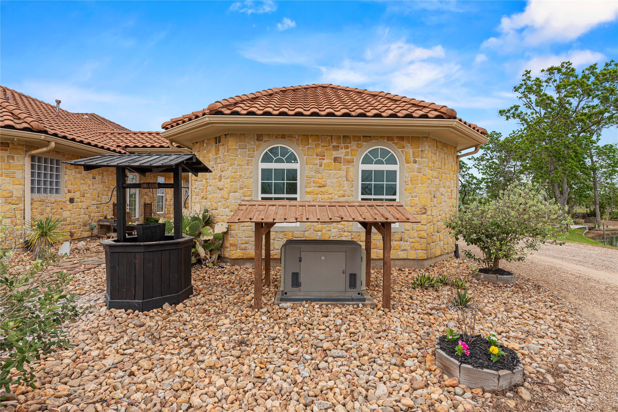 6306 Farm To Market 359 Fulshear, TX 77441 - Photo 38 of 44 The estate is equipped with a 20 kW air-cooled GE backup generator featuring a Vanguard engine. This unit is permanently linked to the house electrical system with an automatic switch gear and is tied directly to the 500-gallon buried propane tank for seamless transition during power loss.