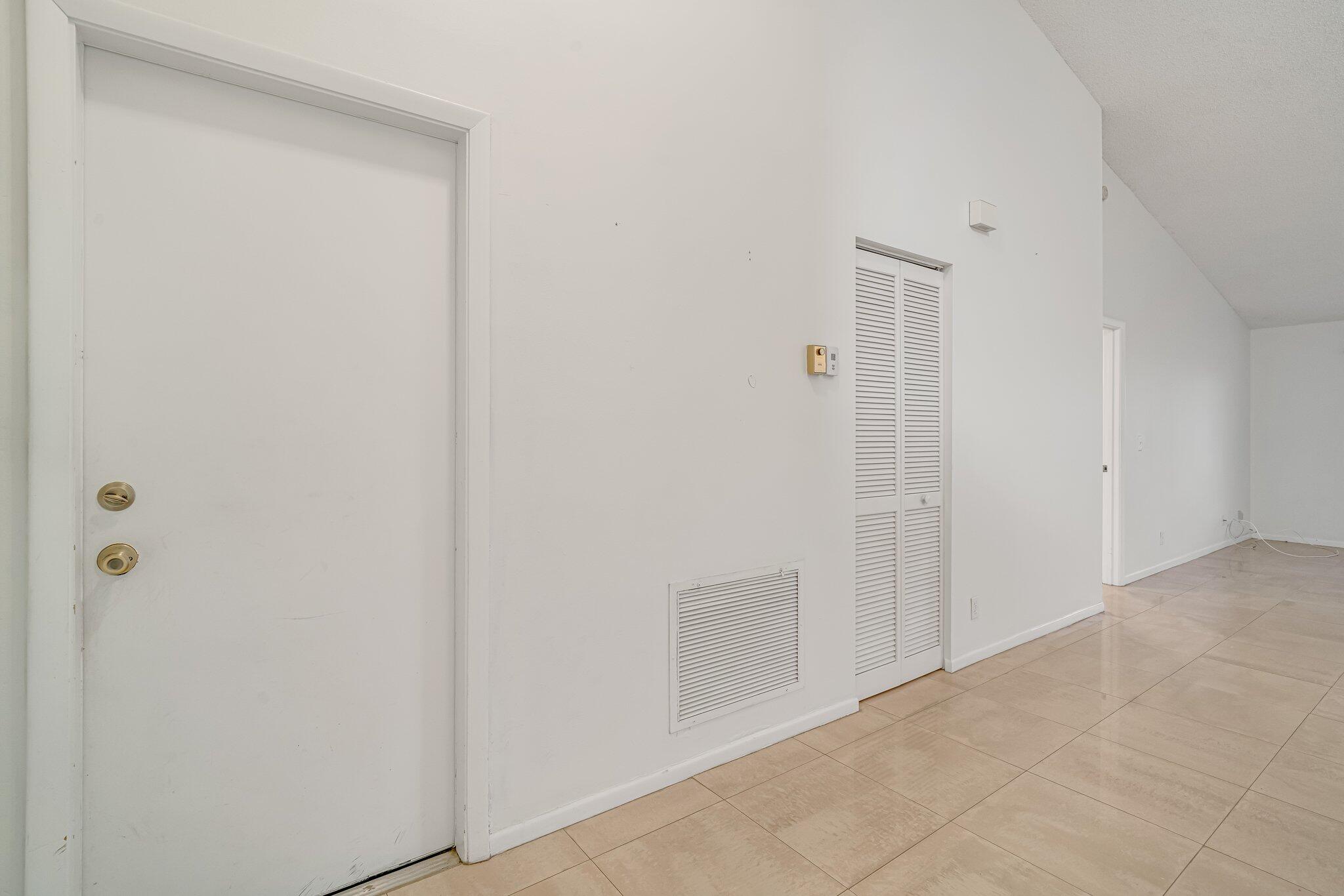 6209 Pond Tree Court Greenacres, FL 33463 - Photo 18 of 38 a view of a hallway