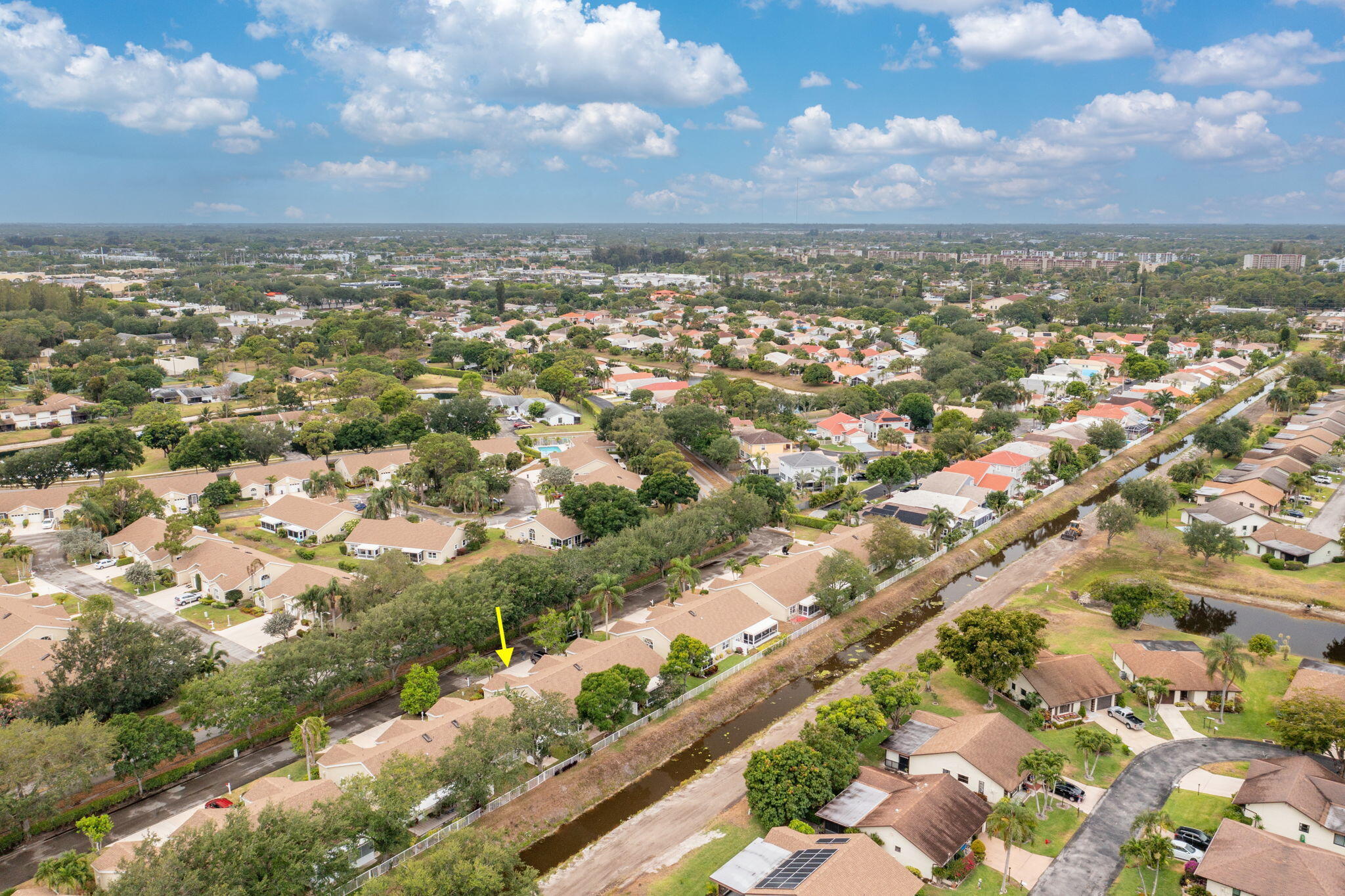 6209 Pond Tree Court Greenacres, FL 33463 - Photo 3 of 38 an aerial view of residential building with green space