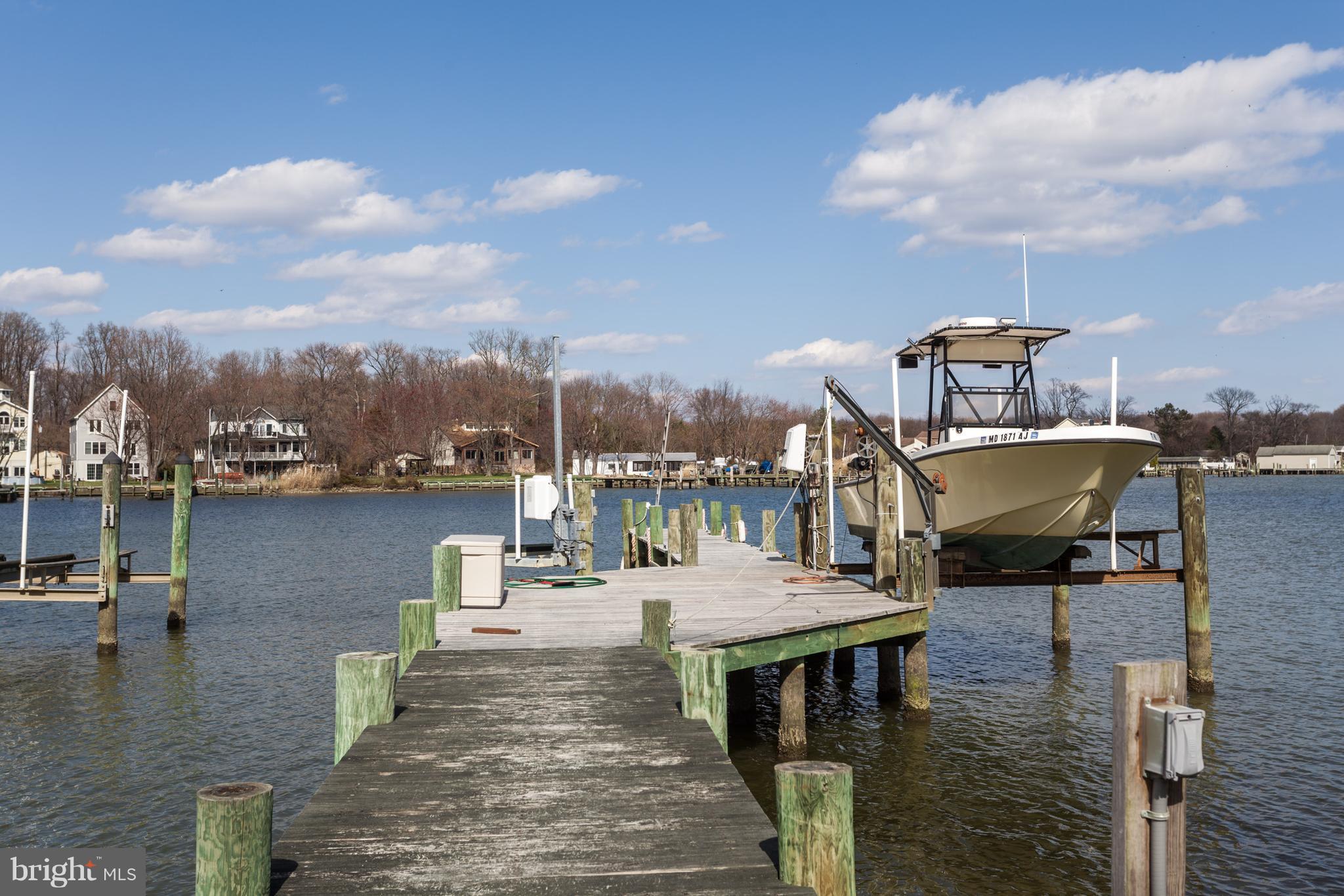 721 Seneca Garden Road Baltimore, MD 21220 - Photo 1 of 30 Pier has been extended. Electric Jet Ski/Boat Lift