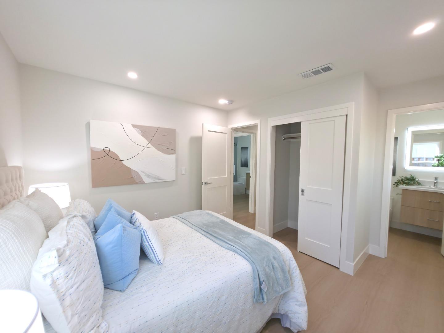 6746 Bollinger Road San Jose, CA 95129 - Photo 16 of 30 a bed room with a bed and a view