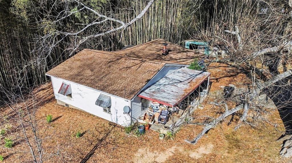 3580 Paul Samuel Road Northwest Kennesaw, GA 30152 - Photo 11 of 15 a view of a house with a yard