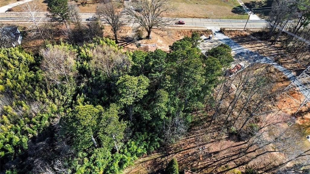 3580 Paul Samuel Road Northwest Kennesaw, GA 30152 - Photo 13 of 15 a view of a yard with plants