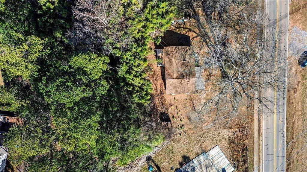 3580 Paul Samuel Road Northwest Kennesaw, GA 30152 - Photo 14 of 15 a backyard of a house with lots of green space