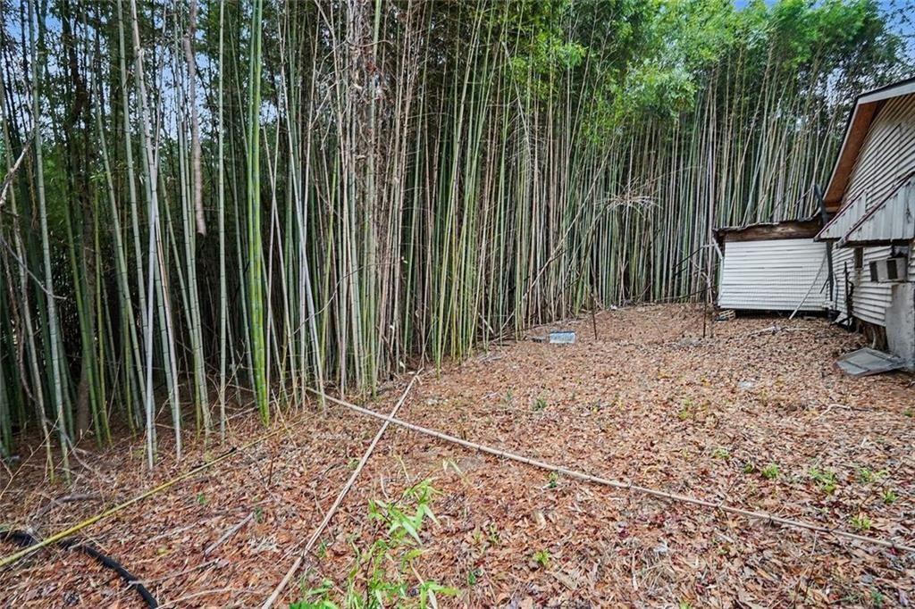 3580 Paul Samuel Road Northwest Kennesaw, GA 30152 - Photo 5 of 15 a wooden fence with trees in the background