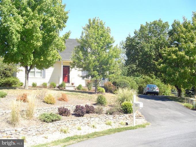 223 Killdeer Road Stephens City, VA 22655 - Photo 2 of 15 a view of a yard with plants and trees