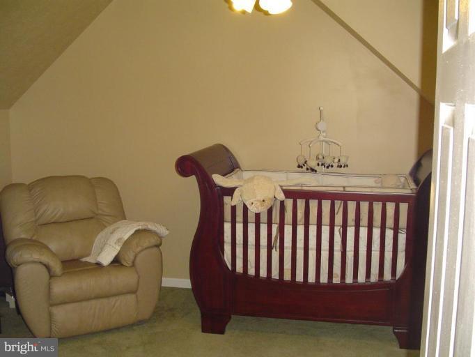 223 Killdeer Road Stephens City, VA 22655 - Photo 14 of 15 a balcony with a couch