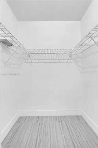 a view of a room with racks on the wall