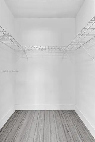 a view of an empty walk in closet