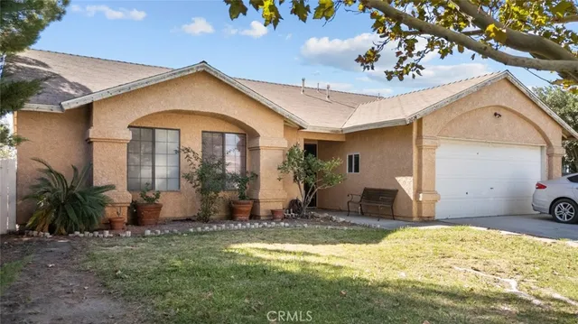 a view of a house with a patio
