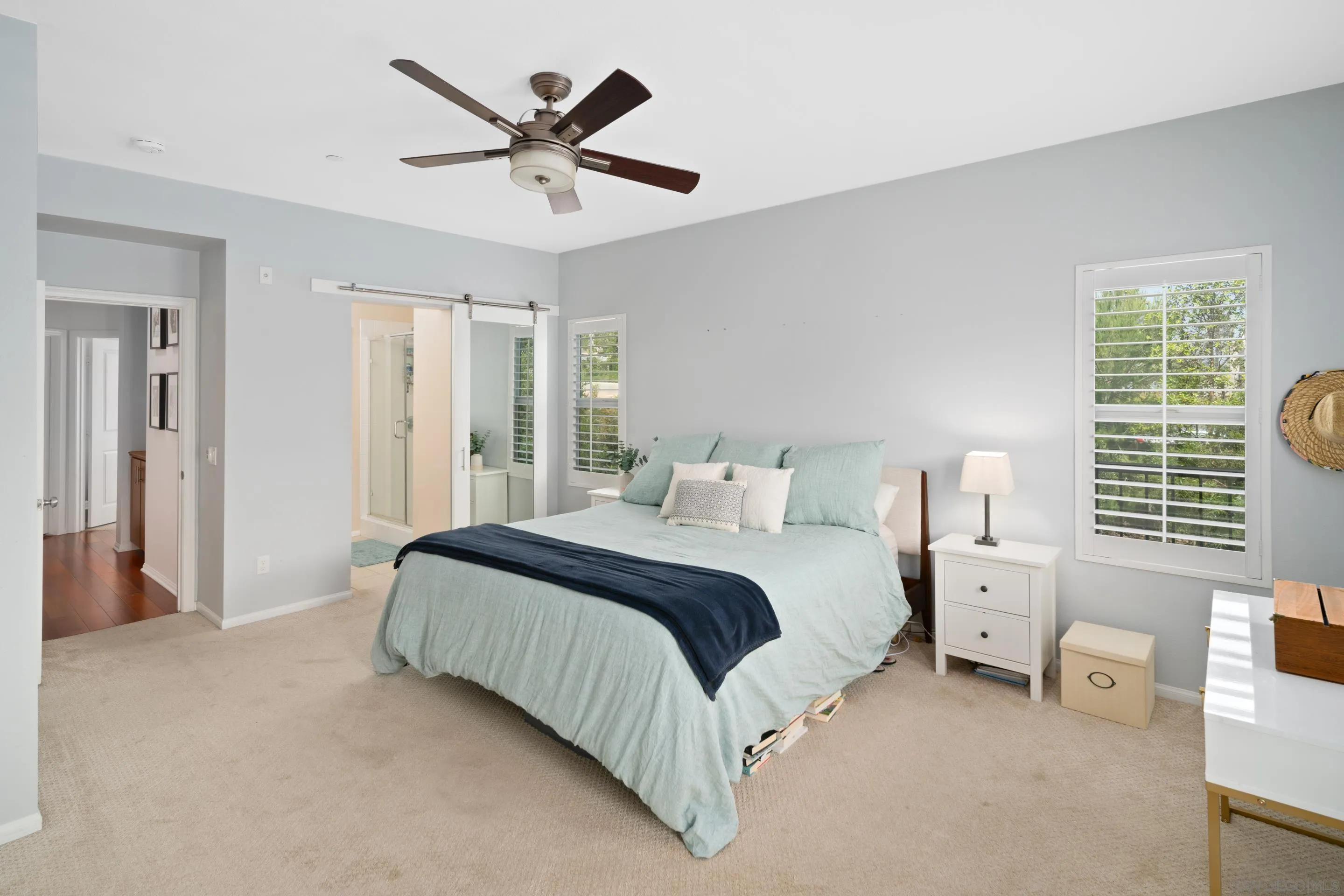 1879 Black Mustard Lane Carlsbad, CA 92011 - Photo 11 of 24 a spacious bedroom with a bed and window