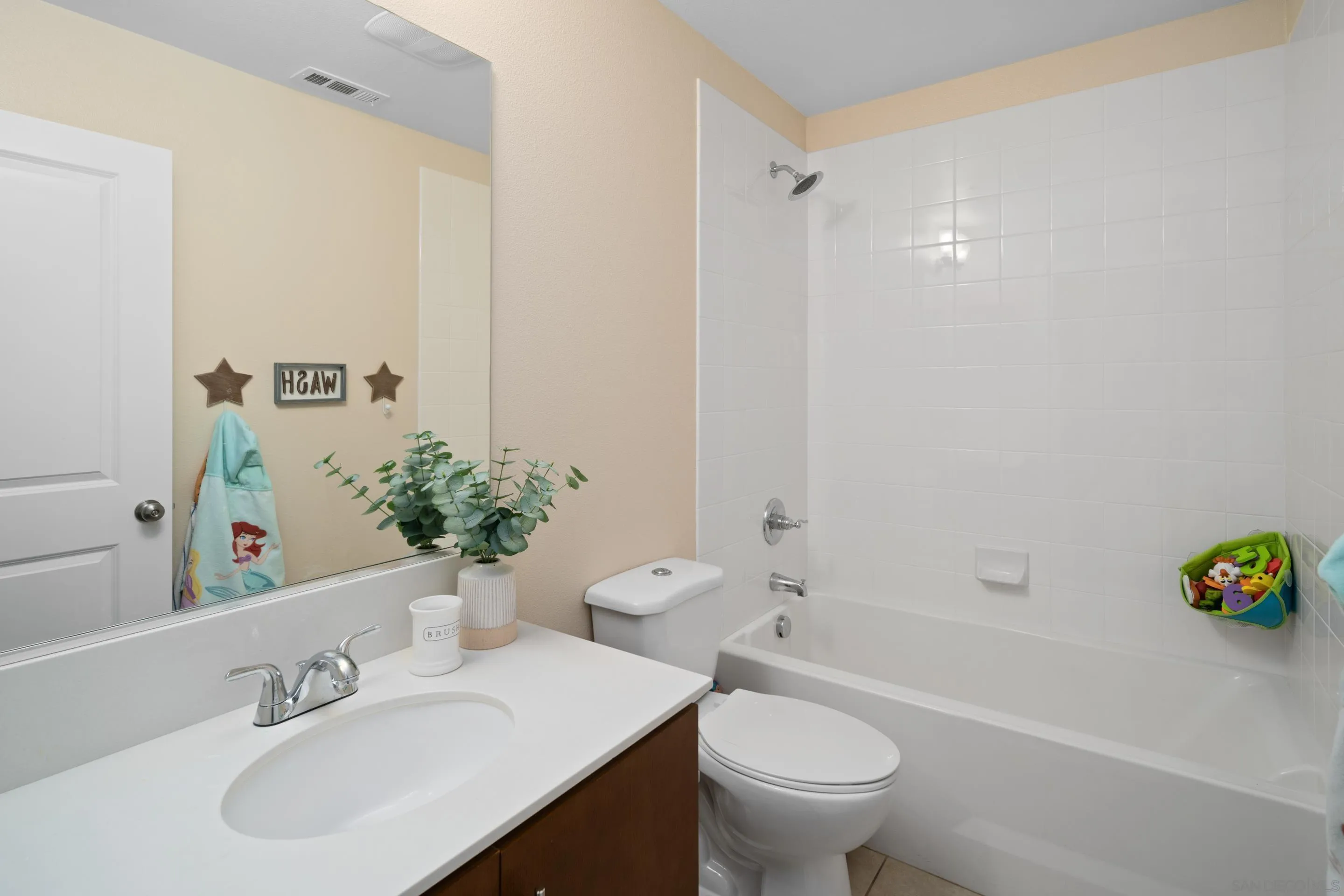 1879 Black Mustard Lane Carlsbad, CA 92011 - Photo 16 of 24 a bathroom with a sink a toilet and shower