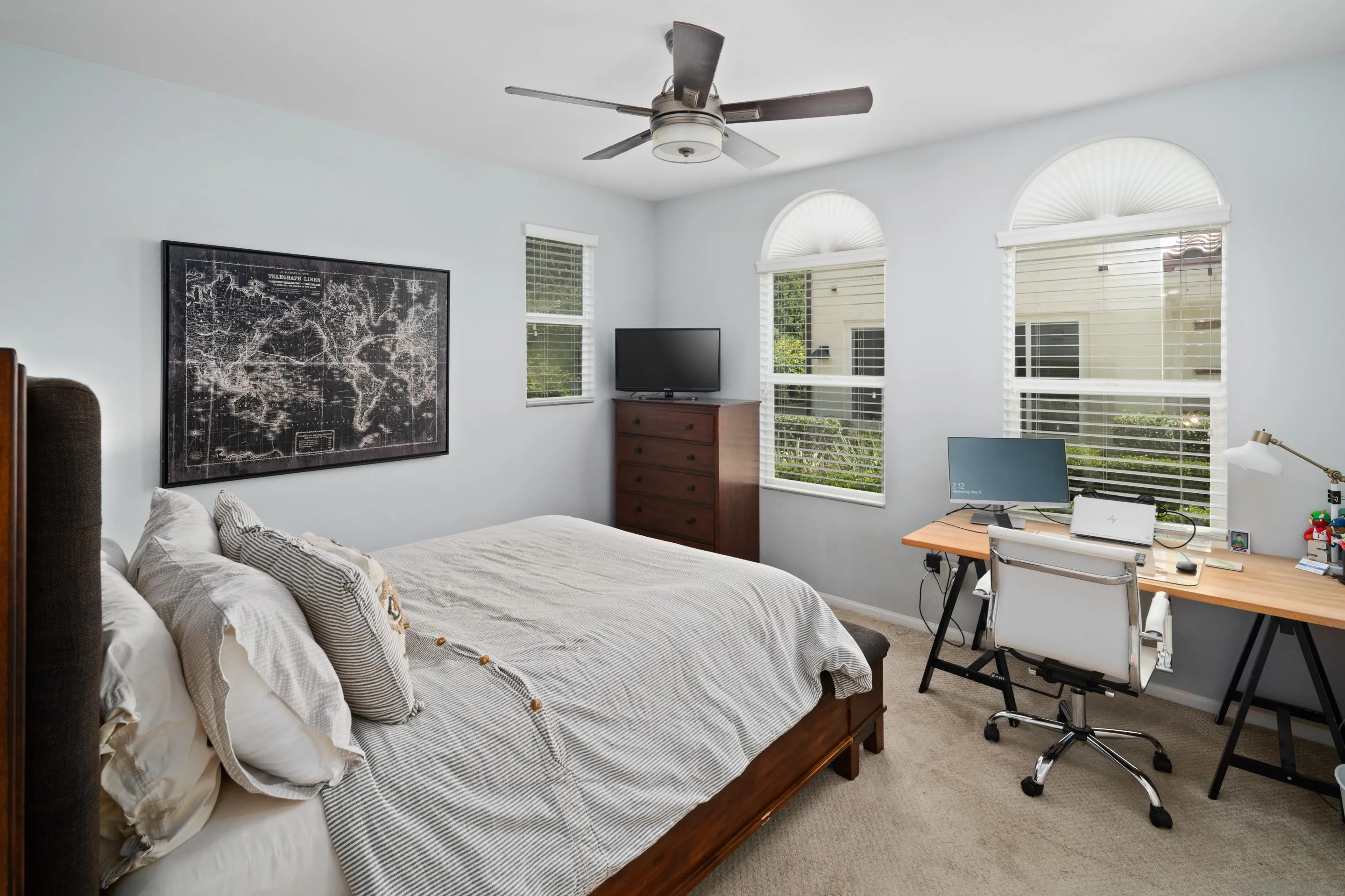 1879 Black Mustard Lane Carlsbad, CA 92011 - Photo 17 of 24 a bedroom with a bed and a desk