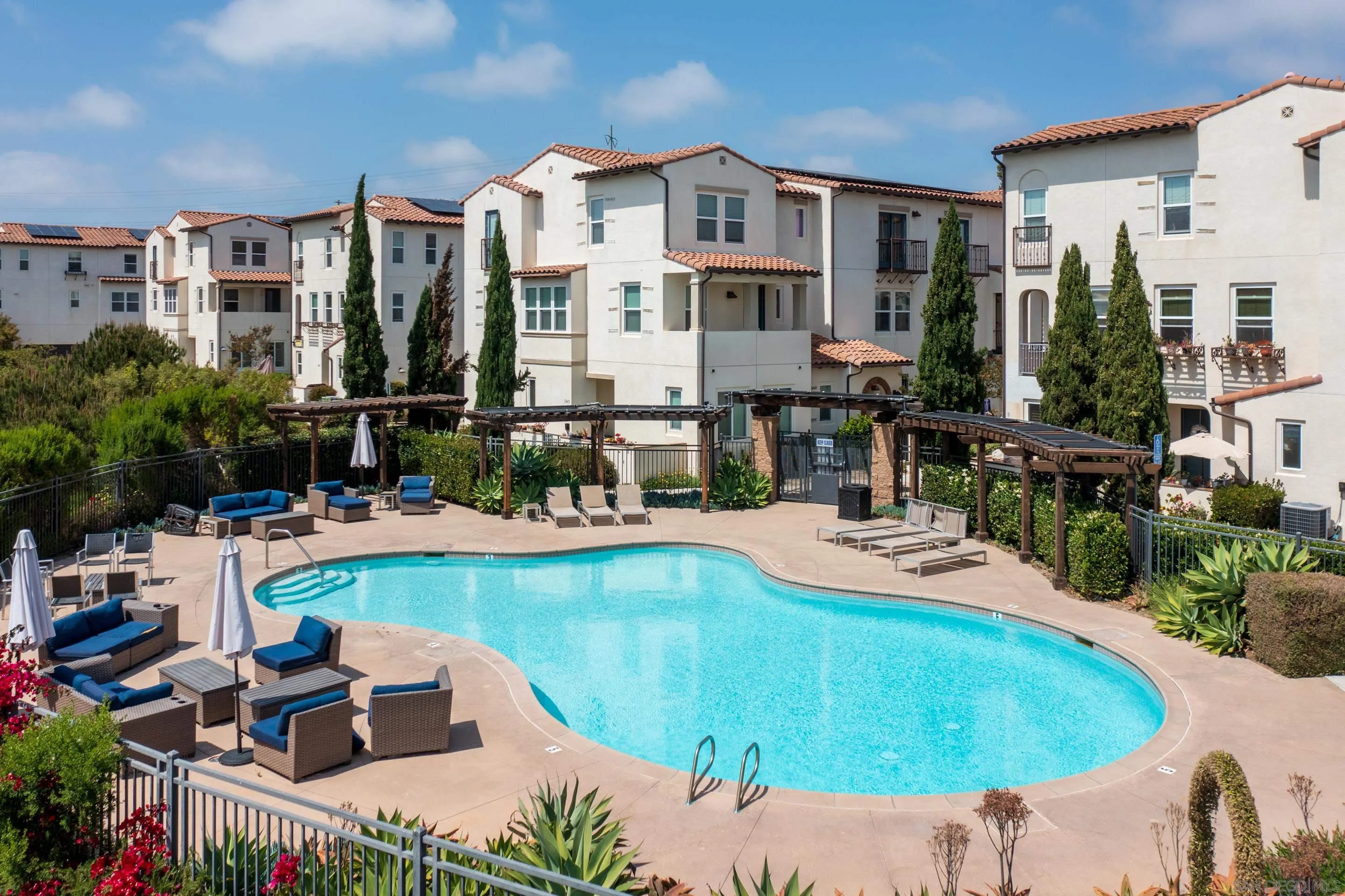1879 Black Mustard Lane Carlsbad, CA 92011 - Photo 24 of 24 a view of a house with backyard outdoor seating area and swimming pool