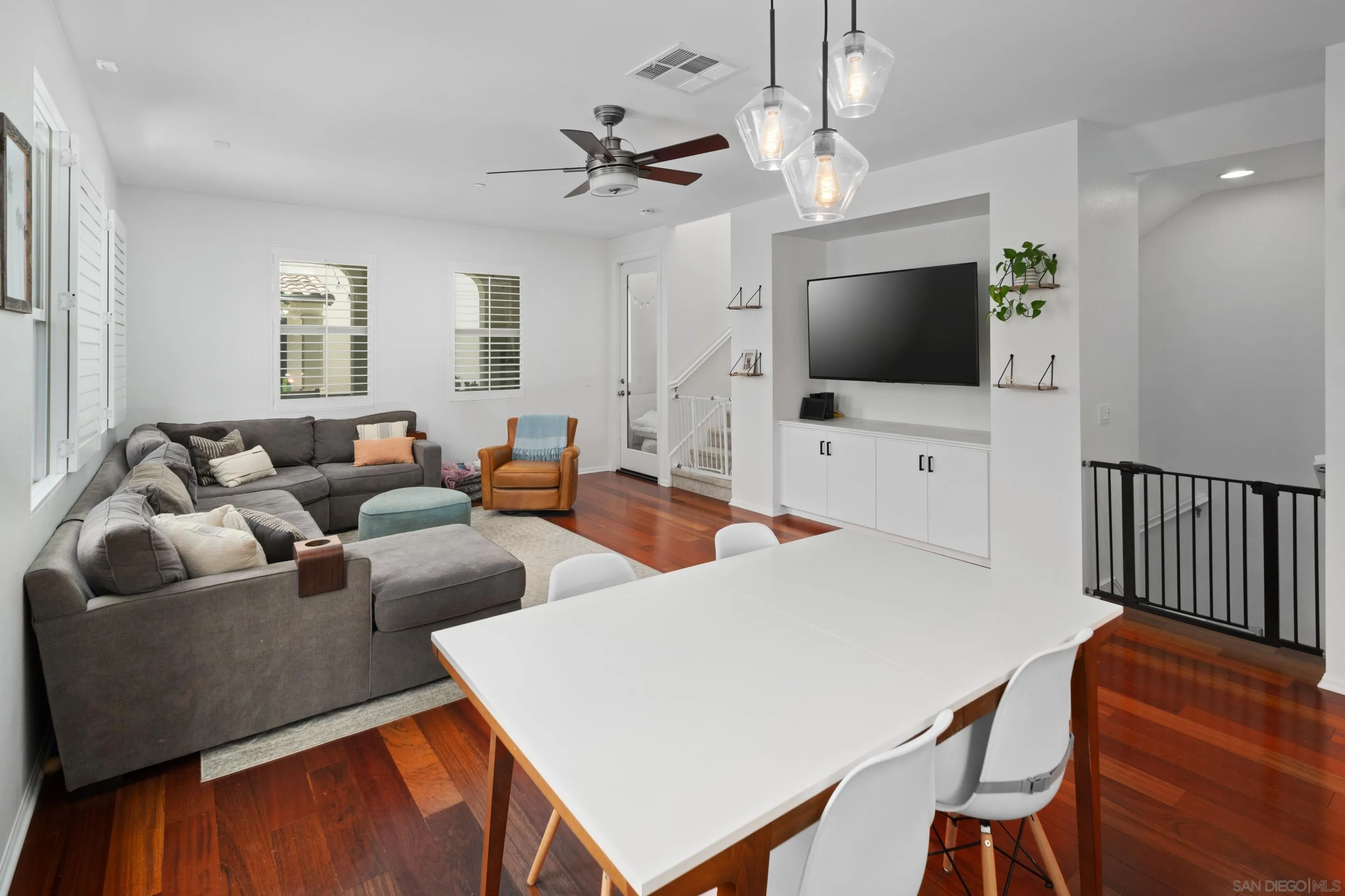 1879 Black Mustard Lane Carlsbad, CA 92011 - Photo 6 of 24 a living room with furniture and a flat screen tv
