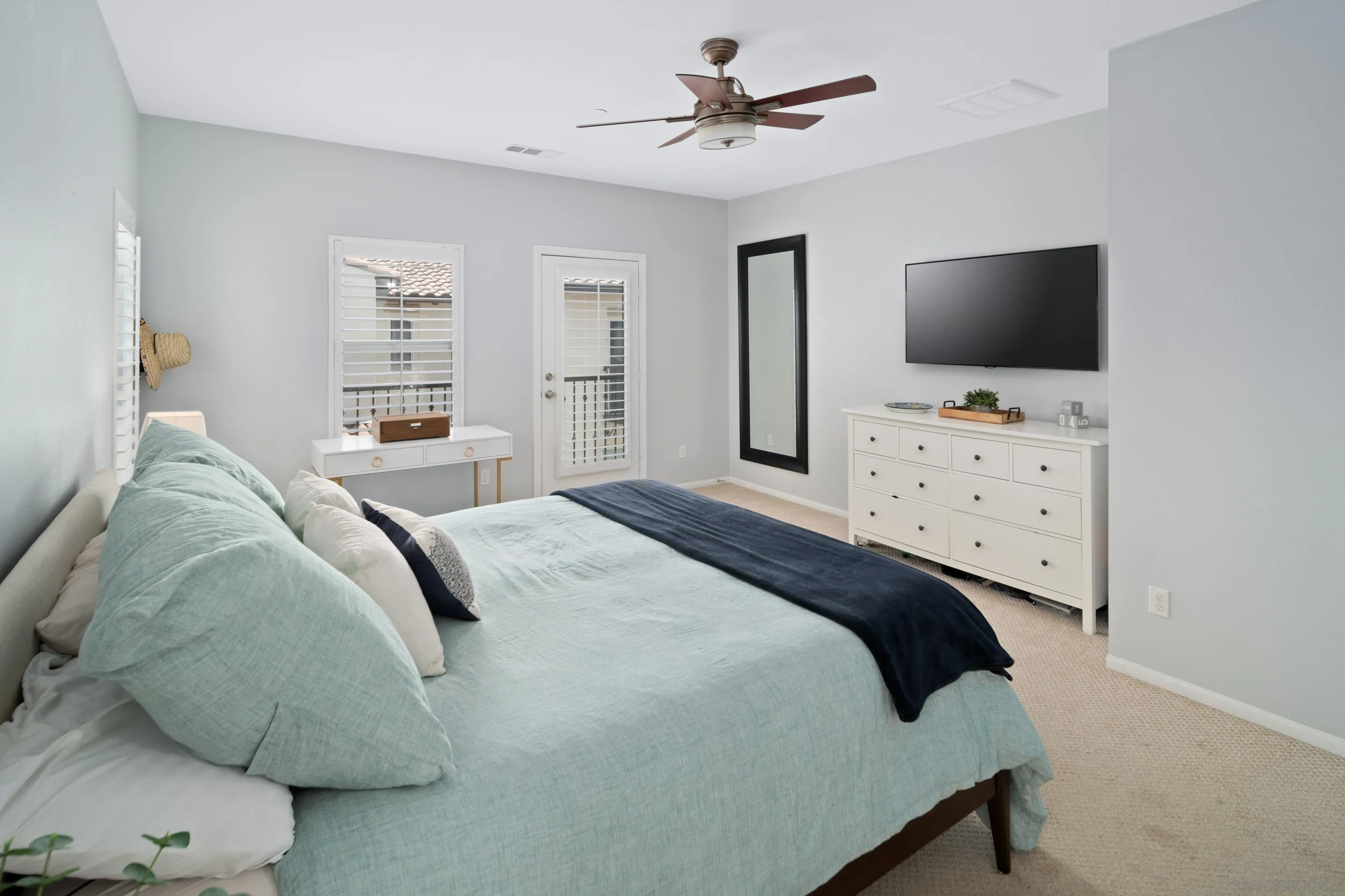 1879 Black Mustard Lane Carlsbad, CA 92011 - Photo 10 of 24 a bedroom with a bed and a flat screen tv