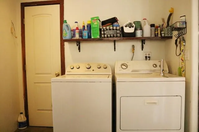 a utility room with dryer and washer