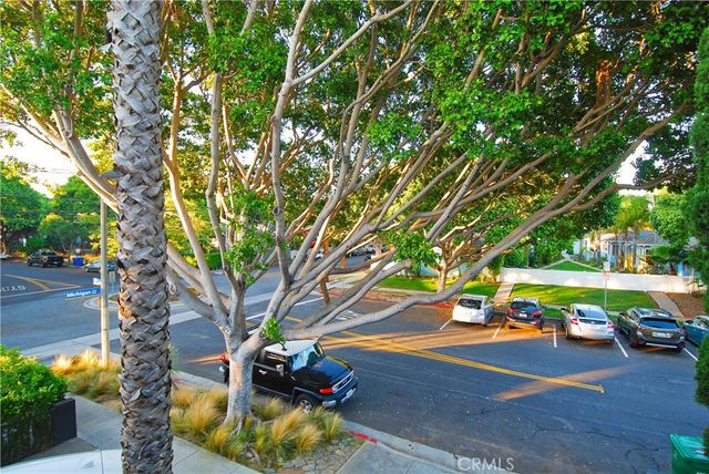 a view of a hallway with washer and dryer