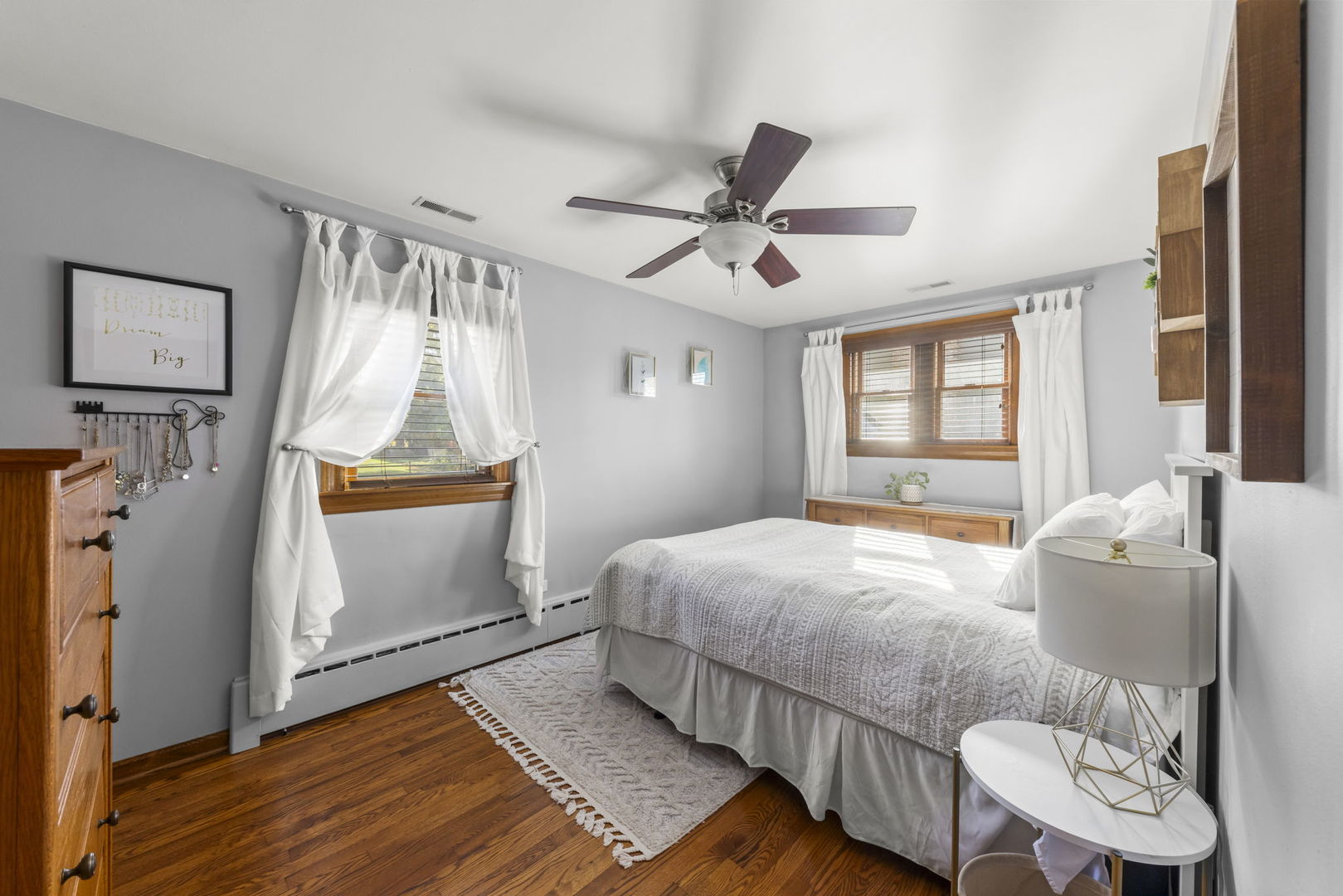 521 Lindley Road Westmont, IL 60559 - Photo 15 of 30 a bedroom with a bed and wooden floor