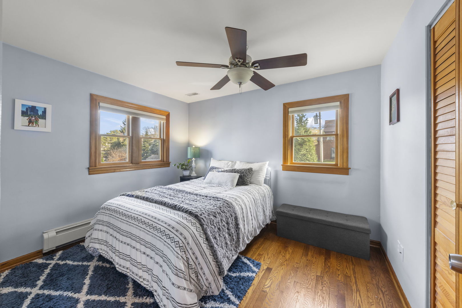 521 Lindley Road Westmont, IL 60559 - Photo 17 of 30 a bedroom with a bed and wooden floor