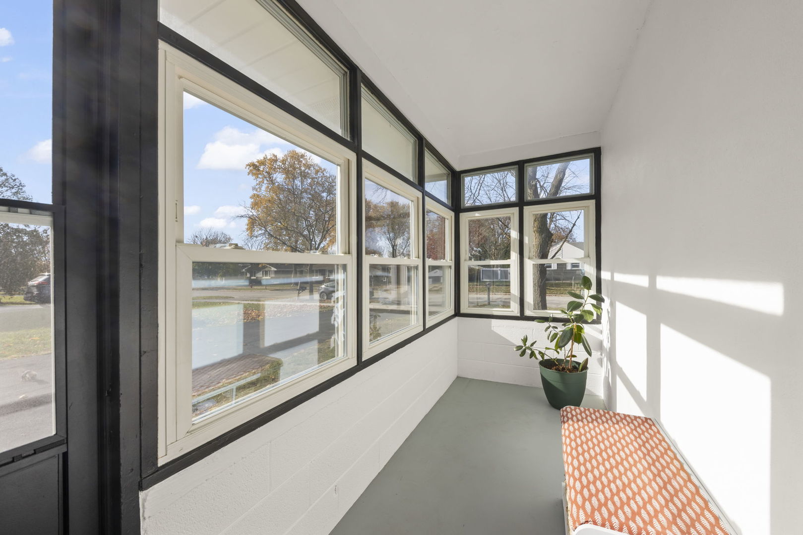 521 Lindley Road Westmont, IL 60559 - Photo 5 of 30 a large room with a large window and furniture