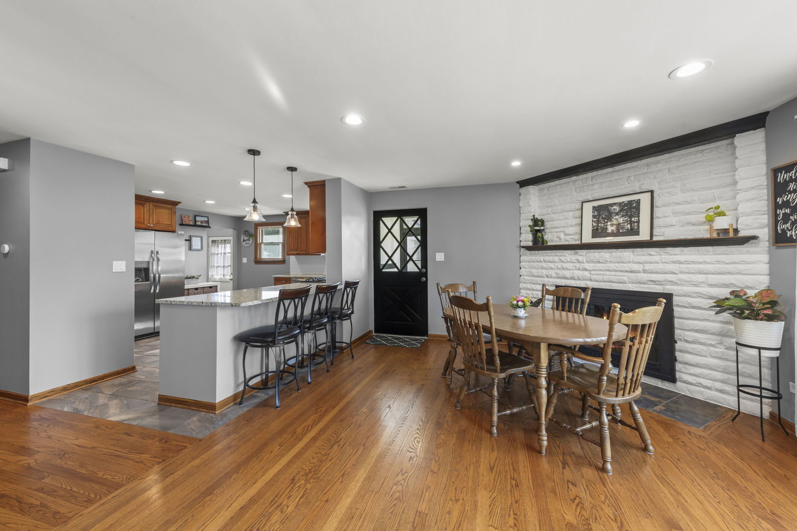 521 Lindley Road Westmont, IL 60559 - Photo 8 of 30 a dining room with furniture and wooden floor