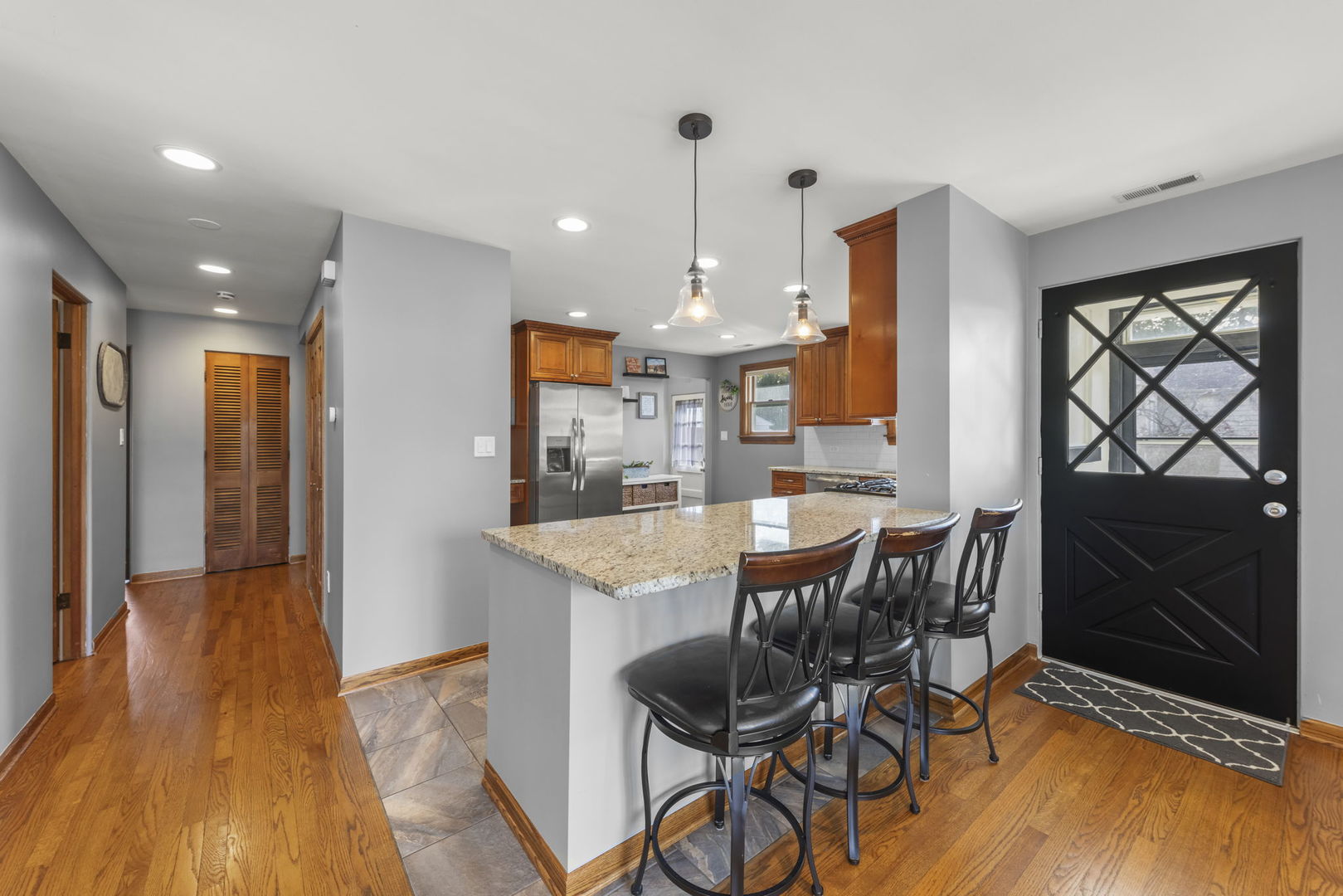 521 Lindley Road Westmont, IL 60559 - Photo 10 of 30 a view of a dining room with furniture window and wooden floor