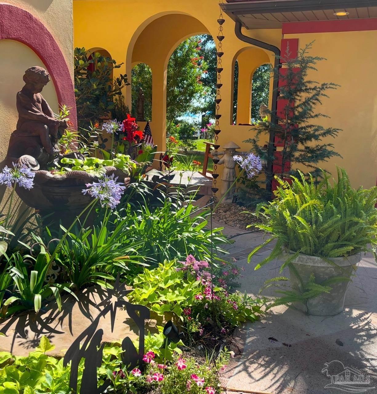 5460 North Shore Road Pensacola, FL 32507 - Photo 48 of 49 a picture of flowers
