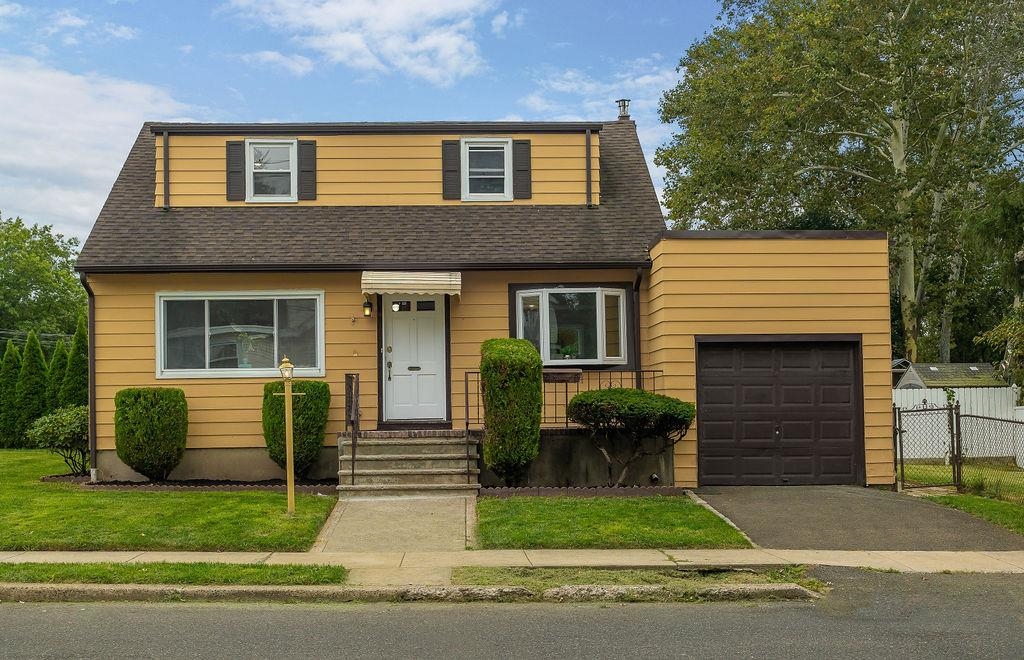 1072 Sayre Road South Union, NJ 07083 - Photo 1 of 31 a view of a house with a yard and a large tree