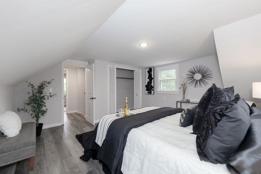 1072 Sayre Road South Union, NJ 07083 - Photo 17 of 31 a bedroom with a bed and a couch