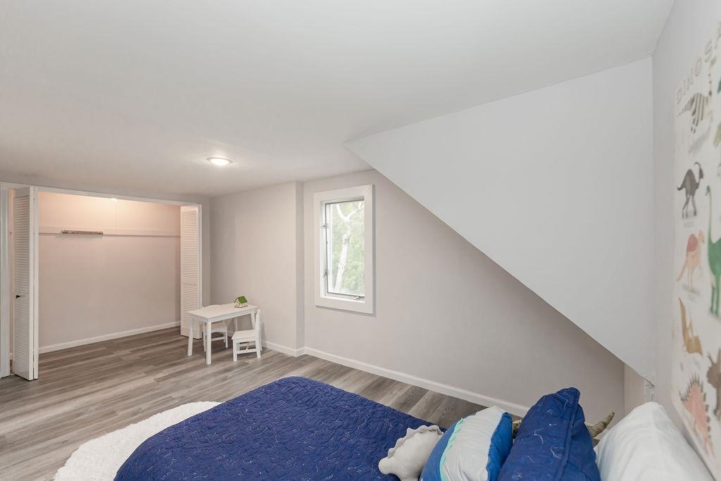1072 Sayre Road South Union, NJ 07083 - Photo 20 of 31 a living room with furniture and a wooden floor