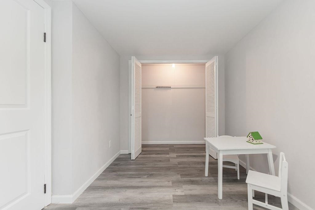 1072 Sayre Road South Union, NJ 07083 - Photo 21 of 31 a view of a dining room with furniture and wooden floor