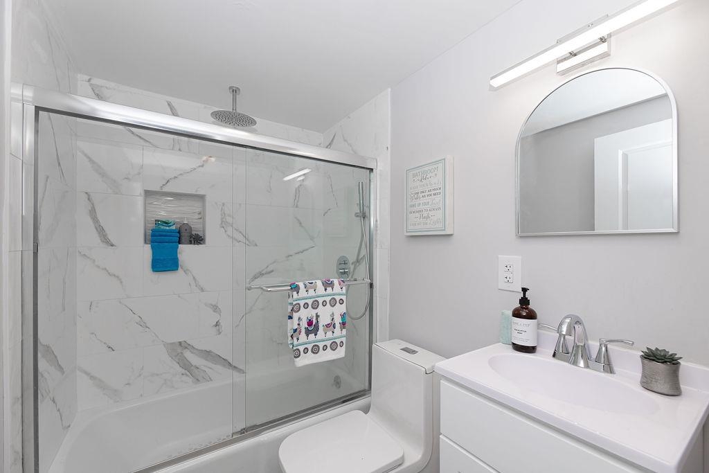 1072 Sayre Road South Union, NJ 07083 - Photo 22 of 31 a bathroom with a sink toilet and shower