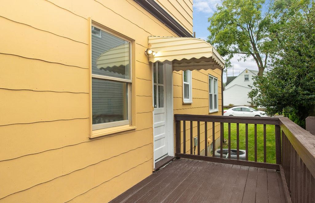 1072 Sayre Road South Union, NJ 07083 - Photo 28 of 31 a view of a balcony with wooden floor and fence